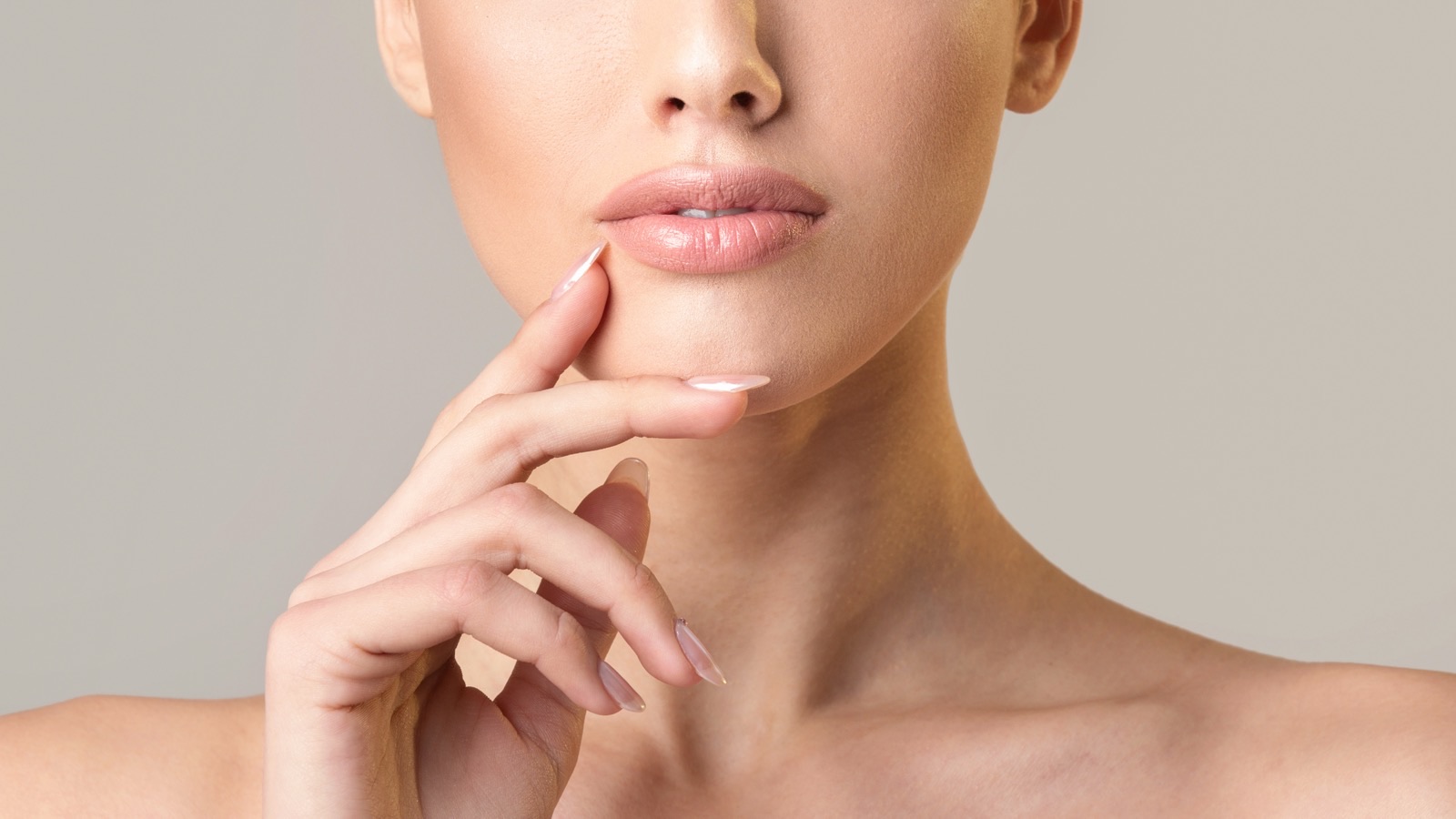 Defined jawline and lips after injectables at Coastal Medical Aesthetics